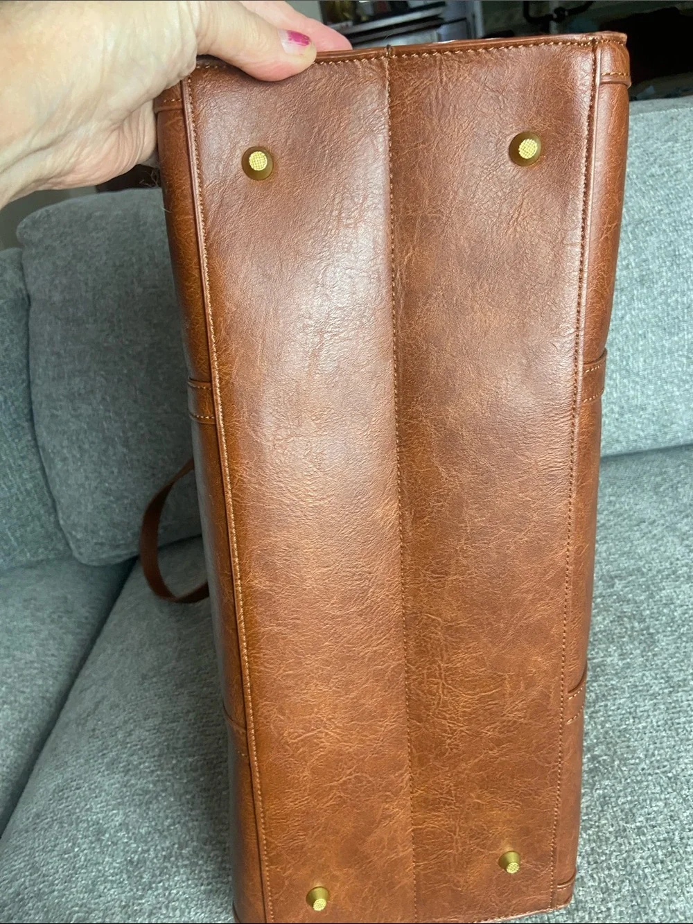 Leather-Textured Tan Tote with Tassel Accent for laptop work